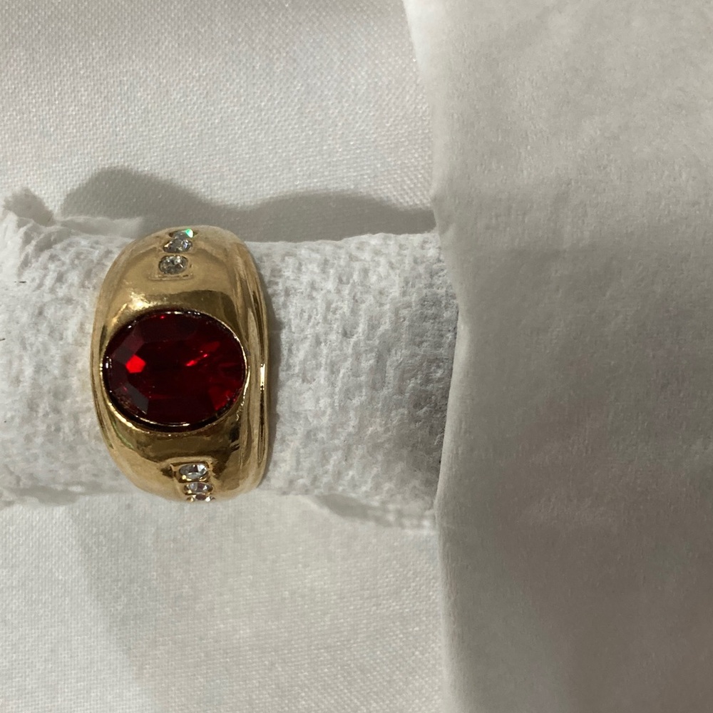 Elegant Gold Plated Ring with Vibrant Red Oval Gem